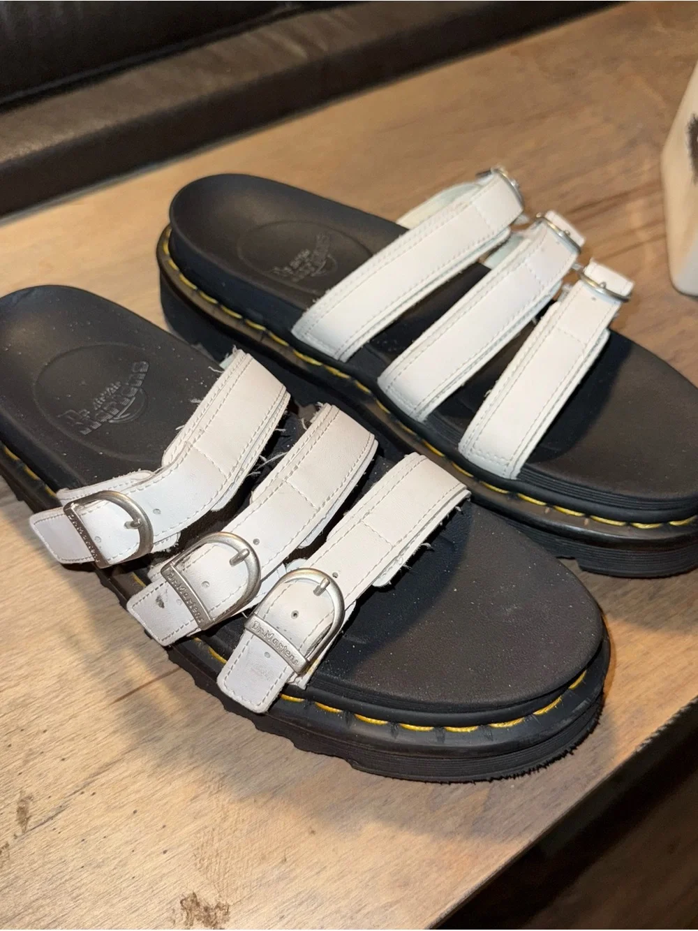Dr. Martens White Triple-Strap Buckle Platform Slides with Yellow Stitching